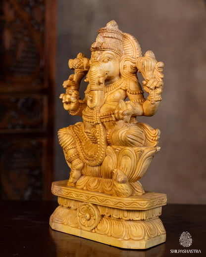 Hand-Carved Wooden Idol of Seated Ganesha on Lotus – Natural Finish